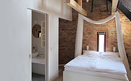 Schlafzimmer, Foto: Wirth Alonso Architekten