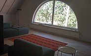 Lounge mit rotem Teppich, Foto: S. Pogorzelski