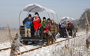 Winter-Märchen-Tour mit der Draisine auf dem Weg nach Mellensee, Foto: Erlebnisbahn GmbH