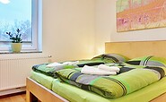 Ferienapartment Suite, 2. Schlafzimmer mit Doppelbett, Foto: Ulrike Haselbauer, Lizenz: Tourismusverband LSL e.V.