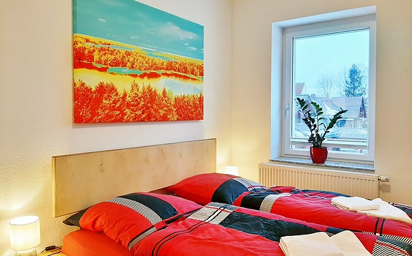 Ferienapartment Suite, 3. Schlafzimmer mit Doppelbett, Foto: Ulrike Haselbauer, Lizenz: Tourismusverband LSL e.V.