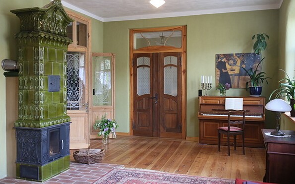 Music room with tiled stove, Foto: Simone Ahrend, Lizenz: Tourismusverband Prignitz e.V.