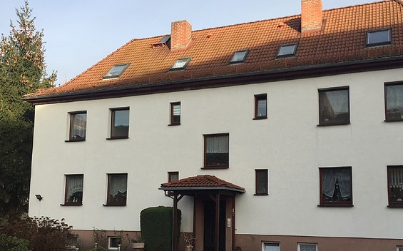 Außenansicht des Mehrfamilienhauses, Foto: Wolf