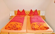 Doppelbett im Schlafzimmer, Foto: René Halla, Lizenz: Ferienwohnung Knappensee
