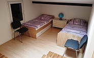 Schlafbereich mit Einzelbetten, Foto: Touristinformation Senftenberg, Lizenz: Tourismusverband Lausitzer Seenland e.V.