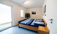 Schlafzimmer mit Doppelbett, Foto: Strandhaus Eden