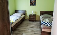 Schlafzimmer mit Einzelbetten - FW Südseite, Foto: Marcus Heberle, Lizenz: Tourismusbverband Lausitzer Seenland e. V.