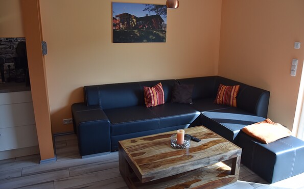 Living area with sitting area, Foto: Ferienhaus Schilfblume