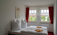 Schlafzimmer kleine Ferienwohnung, Foto: Ferienhof Radlerslust