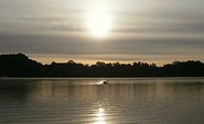 Sonnenaufgang über dem See, Foto: G. Espich, Lizenz: Ferienwohnhaus Drei am Zemminsee