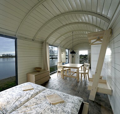 Overnight stay in railroad wagon, Foto: Jens Plate Architekten