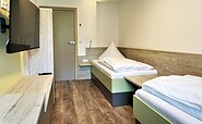 Apartment „Bergen&quot; 2. Schlafzimmer mit getrennt stehenden Betten, Foto: Ulrike Haselbauer, Lizenz: Tourismusverband Lausitzer Seenland e.V.