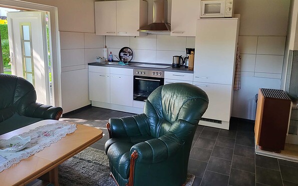 Wohnzimmer mit Küche, Foto: Reschke