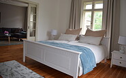 Bedroom with double bed 1st floor, holiday flat church tower, Foto: Körner BTG, Lizenz: Körner BTG