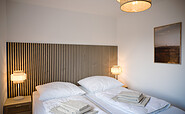 Beispielbild: Doppelbett im Schlafbereich, Foto: Timotheus Israel, Lizenz: Skan-Park