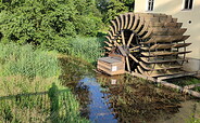 Mühlrad und Wasser, Foto: Elstermühle Plessa, Lizenz: Elstermühle Plessa