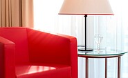 Zimmeransicht mit Sessel, Foto: Sorat Hotel Cottbus, Lizenz: Sorat Hotel Cottbus