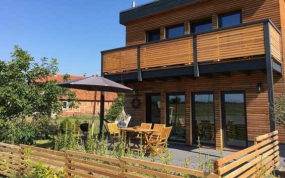 Ferienhaus mit Holzverkleidung, Foto: Nancy Jirjahn, Lizenz: TVP