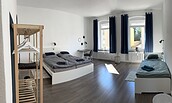 Schlafzimmer 1, Doppelbett mit Einzelbett, Foto: Ferienwohnung Gubener Neißeglück 23 , Lizenz: Ferienwohnung Gubener Neißeglück 23