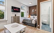 Viel Platz für drei Personen bietet das Apartment 2, Foto: Backbone, Lizenz: Vorstadtoase Eichwalde
