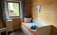Kleines Schlafzimmer mit Tagesbett zum Ausziehen, Foto: Andreas Pätsch