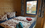 Schlafzimmer mit Doppelbett, Foto: Andreas Pätsch