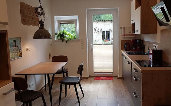 Kitchen with seating area , Foto: Udo Reifschläger