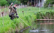 Forellenanlage, Fisch springt, Foto: Florian Läufer, Lizenz: Seenland Oder-Spree