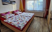 Schlafzimmer im Ferienhaus, Foto: Ute Adamick