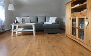 Ferienwohnung Oderbruch  – Wohnzimmer mit Sitzecke, Foto: Seenland Oder-Spree