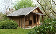 ROJI Japanische Gärten - Die Teehütte steht in einem separaten Gartenteil, der ganz der Teezeremonie gewidmet ist, Foto: Gesine Jochems, Lizenz: Gesine Jochems