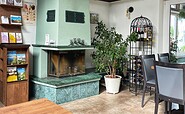 fireplace room at the Restaurant in the "Haus Katharinensee" hotel , Foto: Constanze Mikeska, Lizenz: Seenland Oder-Spree