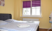 Schlafzimmer mit Doppelbett, Foto: Kerstin Geilich, Lizenz: MuT