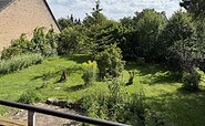 Ferienwohnung Jakobshagen, Blick in den Garten vom Balkon, Foto: Alena Lampe, Lizenz: TMU GmbH