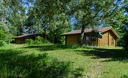 Log cabins on the hill, Foto: Cathrin Bach , Lizenz: Brennickenswerder GmbH u. Co.KG