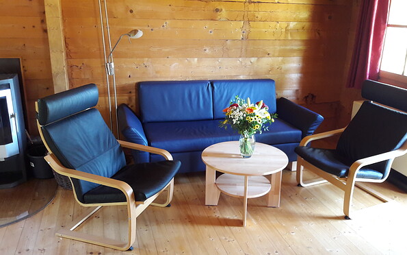 Log cabin, living room, Foto: Meike Holstein , Lizenz: Brennickenswerder GmbH u. Co.KG