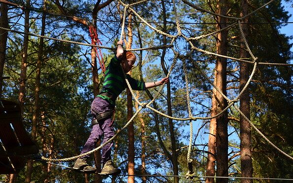 Klettern an der Kletterspinne, Foto: Kletterwald Schorfheide, Lizenz: Kletterwald Schorfheide