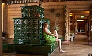 Entspannung am Kachelofen in der Spreewaldscheune, Foto: Spreewelten GmbH