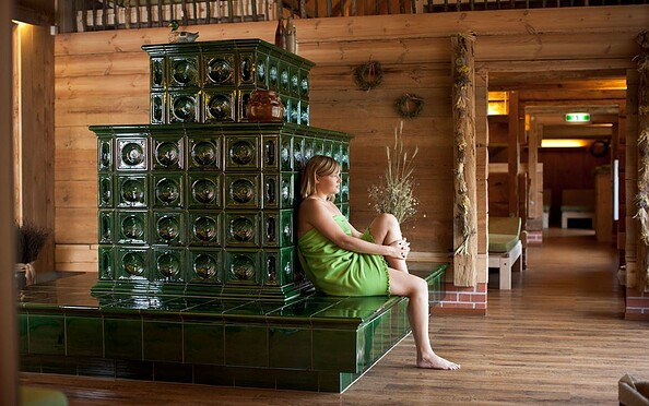 Entspannung am Kachelofen in der Spreewaldscheune, Foto: Spreewelten GmbH