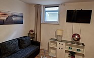 Couch und TV im Wohnbereich, Foto: Düring