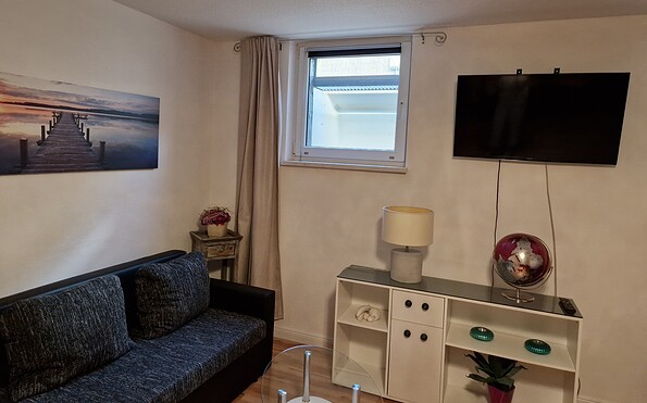 Couch und TV im Wohnbereich, Foto: Düring