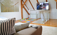 Gästewohnung OG Wohnbereich, TV, Foto: Kerstin Geilich, Lizenz: MuT