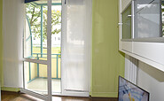 Wohnzimmer/ Blick zum Balkon, Foto: Kerstin Geilich, Lizenz: MuT Guben