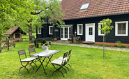 Außenansicht mit Garten, Foto: Sabine Ducos, Lizenz: NaturApartments HideAway &amp; Spa