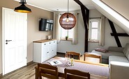 Ferienwohnung Refugium - Wohn- und Essbereich, Foto: Ulrike Haselbauer, Lizenz: Tourismusverband Lausitzer Seenland e.V.