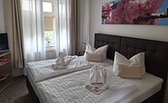 Schlafzimmer, Foto: Ferienwohnung MIWE Gesundheitszentrum, Lizenz: Ferienwohnung MIWE Gesundheitszentrum