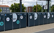 Fahrradboxen Bahnhof Guben ChatGPT, Foto: Frau Maj, Lizenz: Stadt Guben