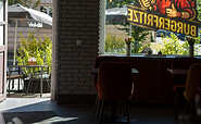 Dining area with a view of the outdoor space, Foto: Hannah Kremer, Lizenz: Frederic Höfer