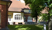 Volkshaus Wildau, Eingang, Foto: Petra Förster, Lizenz: Tourismusverband Dahme-Seenland e.V.
