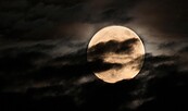 Super bright full moon and partially covered with dramatic black sky clouds., Foto: © 2016 by Ppalis Michalakis , Lizenz: AdobeStock_134380217